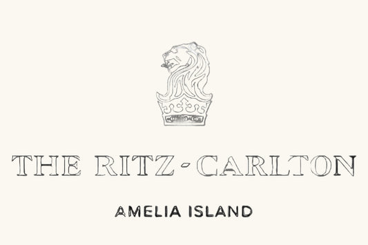 The Ritz-Carlton Amelia Island logo on a white background