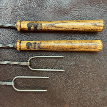 Campfire roasting sticks with American flag engraved on handle